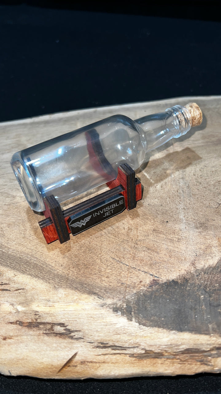 Wonder Woman’s Invisible Jet in a Shot Bottle
