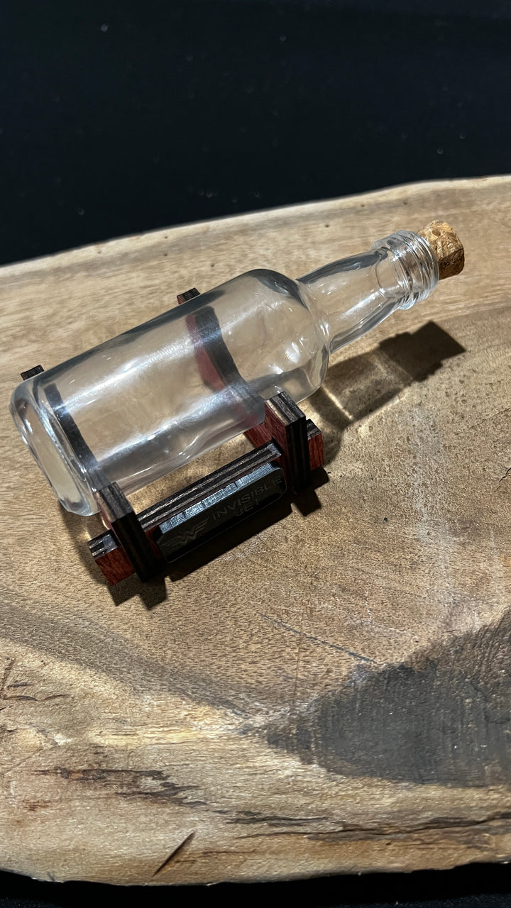 Wonder Woman’s Invisible Jet in a Shot Bottle